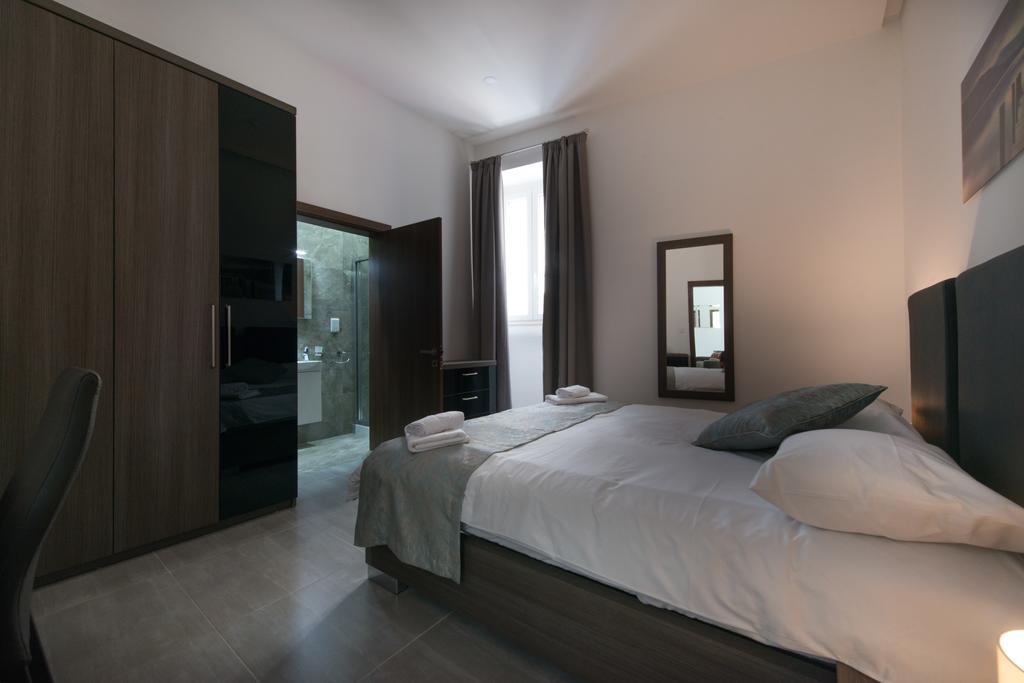 Hacienda Apartments Слима Екстериор снимка