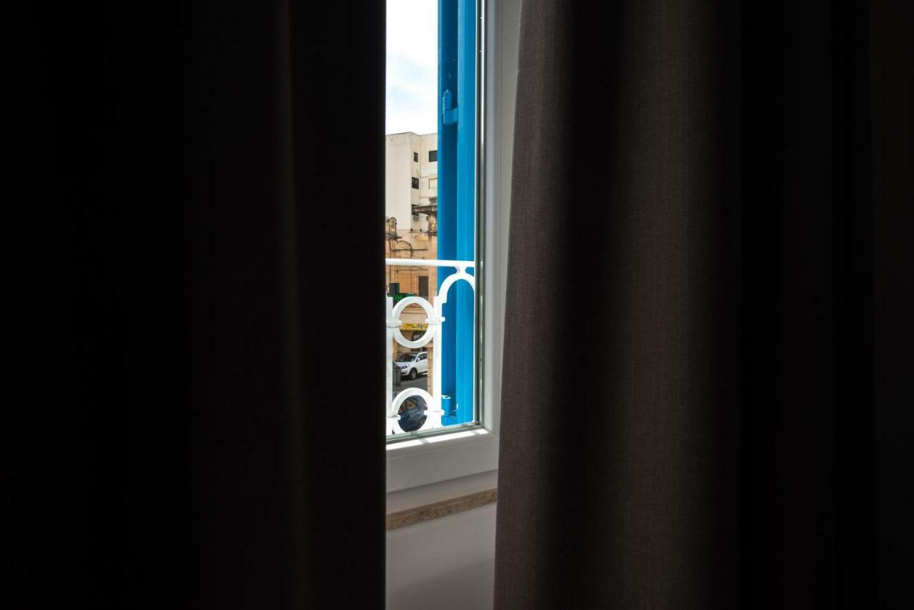 Hacienda Apartments Слима Екстериор снимка